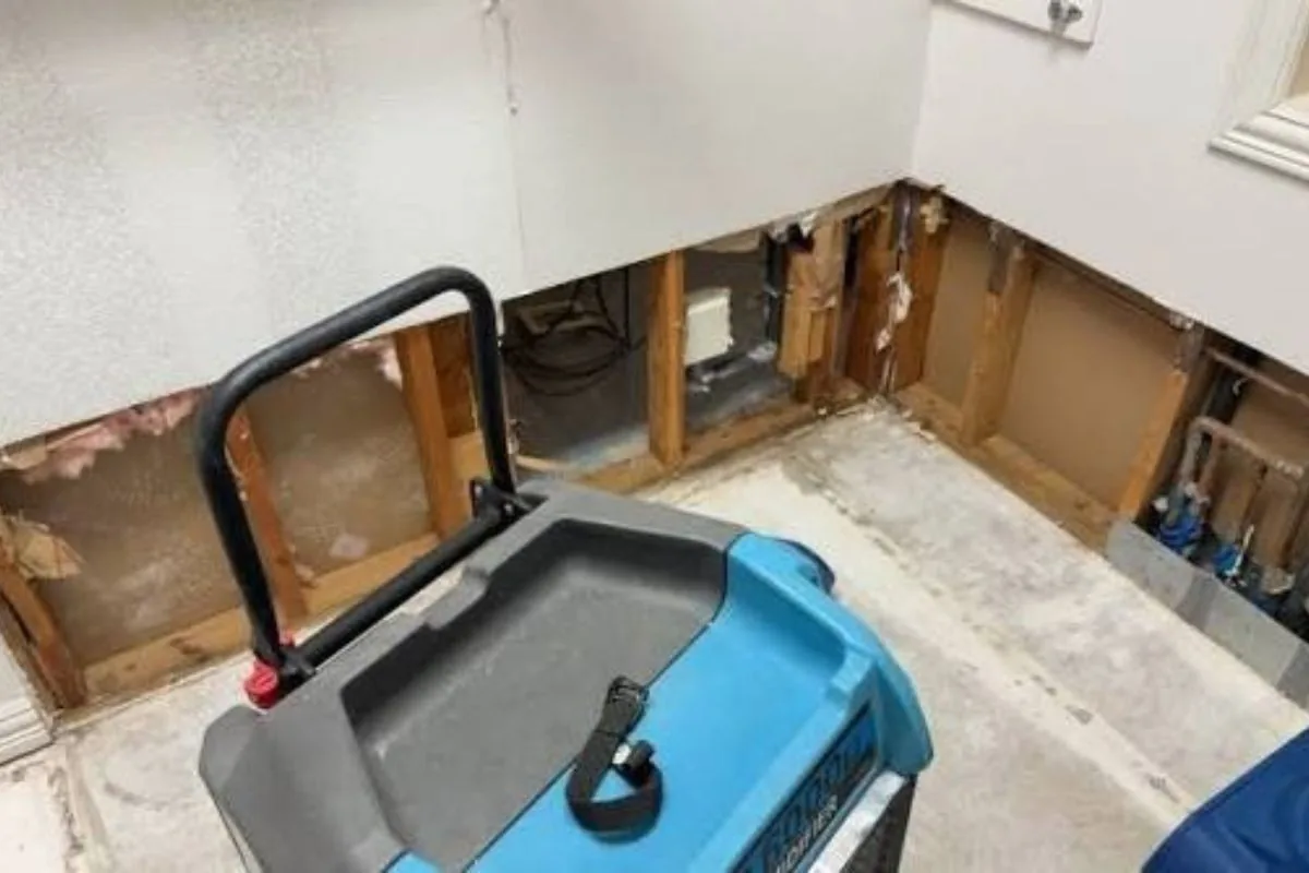 Flood cut drywall and drying equipment along a lower wall